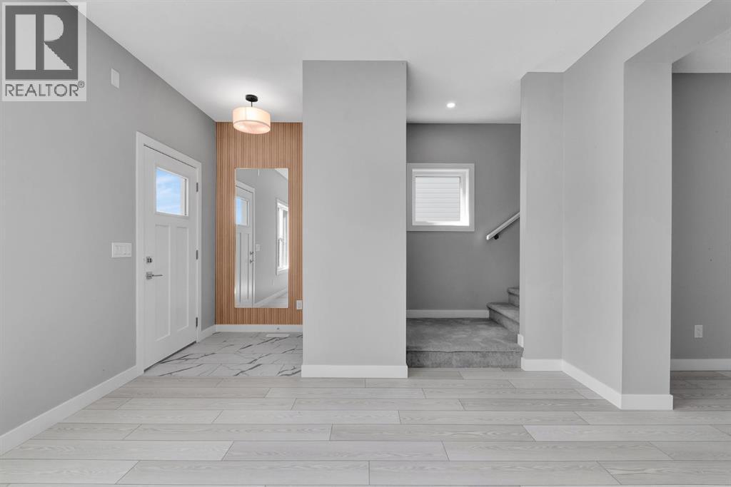 157 Dawson Wharf View, Chestermere, AB - Indoor Photo Showing Other Room