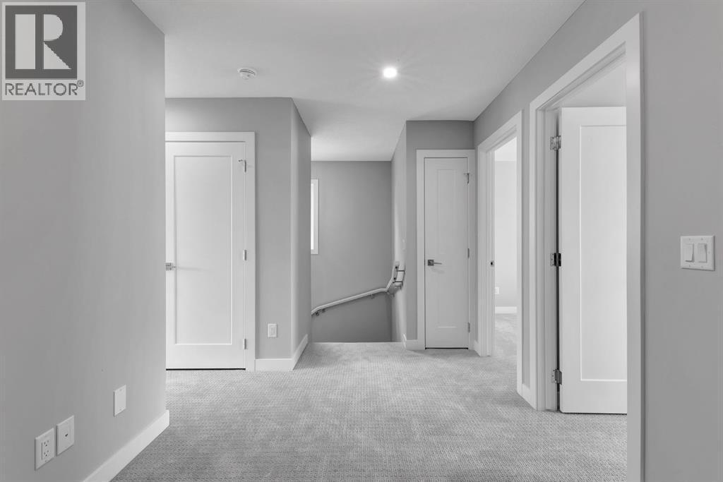 157 Dawson Wharf View, Chestermere, AB - Indoor Photo Showing Laundry Room