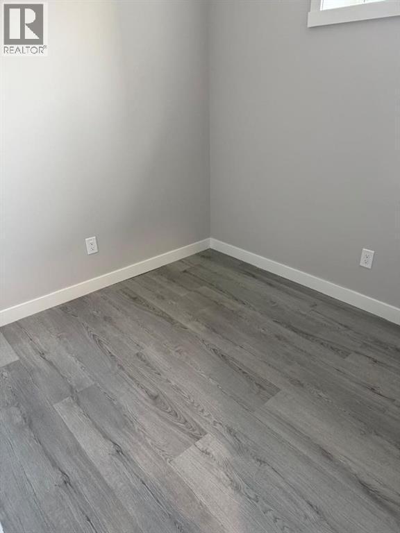 157 Dawson Wharf View, Chestermere, AB - Indoor Photo Showing Other Room