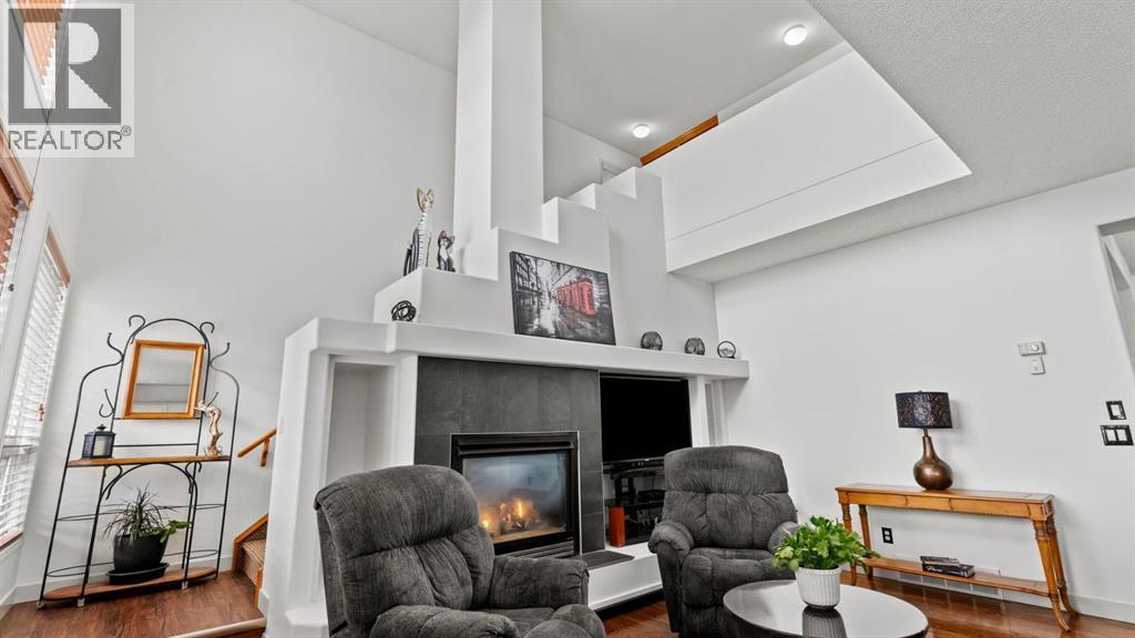 27 Cranwell Close Se, Calgary, AB - Indoor With Fireplace