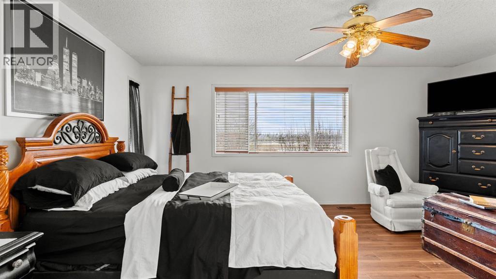 27 Cranwell Close Se, Calgary, AB - Indoor Photo Showing Bedroom