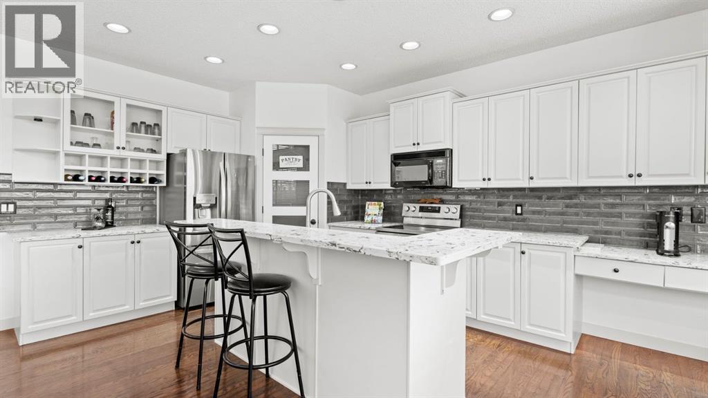 27 Cranwell Close Se, Calgary, AB - Indoor Photo Showing Kitchen With Upgraded Kitchen