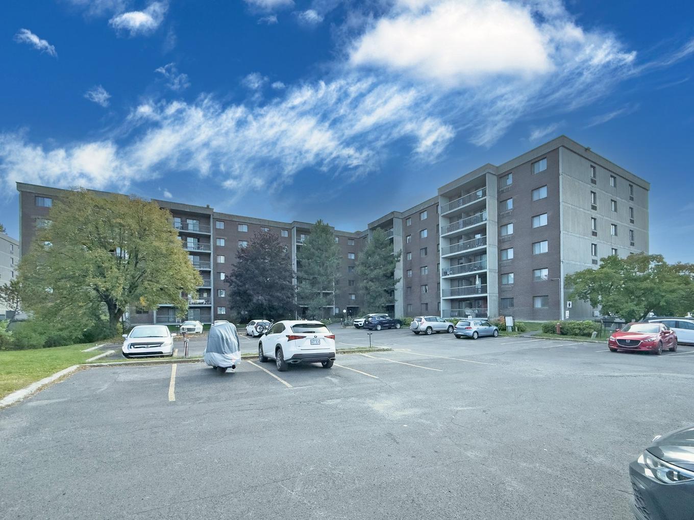 Stationnement - 309-1550 Av. Panama, Brossard, QC - Outdoor With Facade