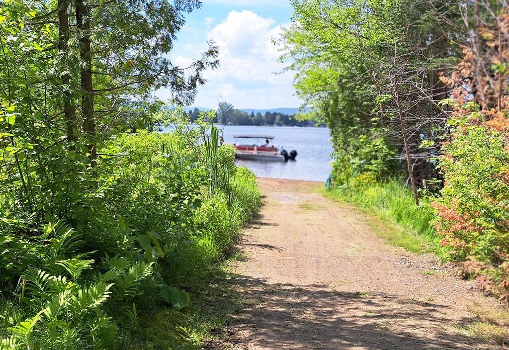 Access to a body of water - 11 Rue Karine, Saint-Jean-De-Matha, QC - Outdoor With Body Of Water With View