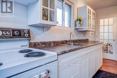 310 The Westway, Toronto, ON - Indoor Photo Showing Kitchen With Double Sink