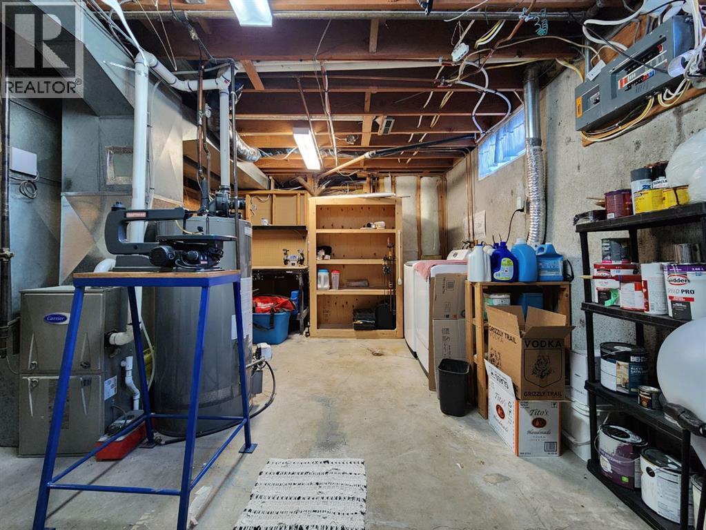 214 48 Avenue E, Claresholm, AB - Indoor Photo Showing Basement