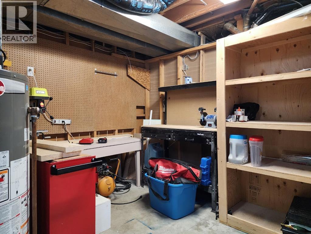 214 48 Avenue E, Claresholm, AB - Indoor Photo Showing Basement