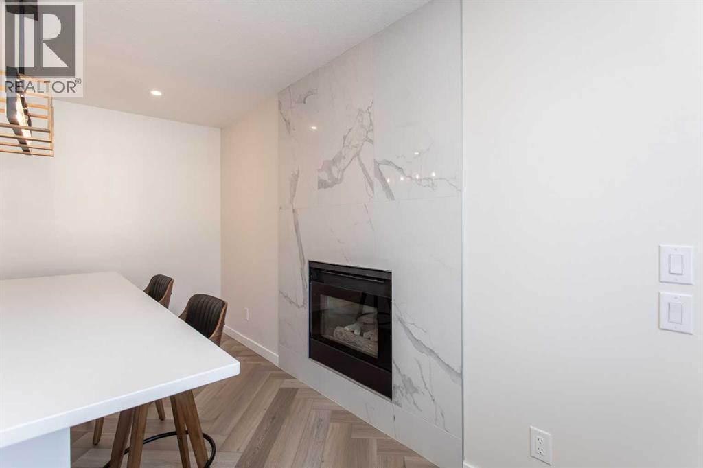 10 Pickwick Lane, Lacombe, AB - Indoor With Fireplace