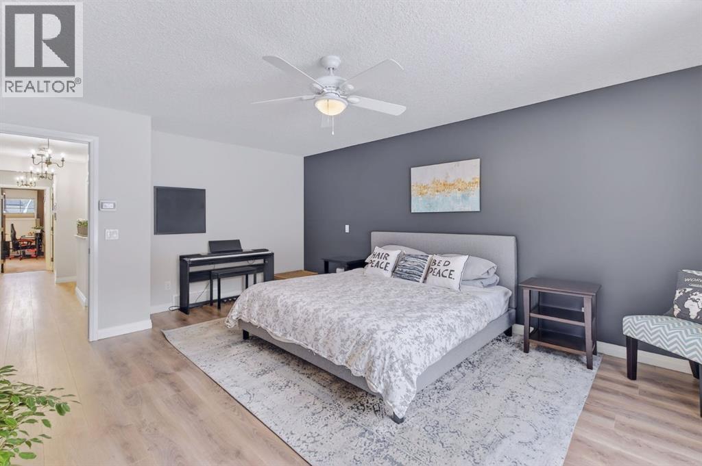 105 Riviera Crescent, Cochrane, AB - Indoor Photo Showing Bedroom