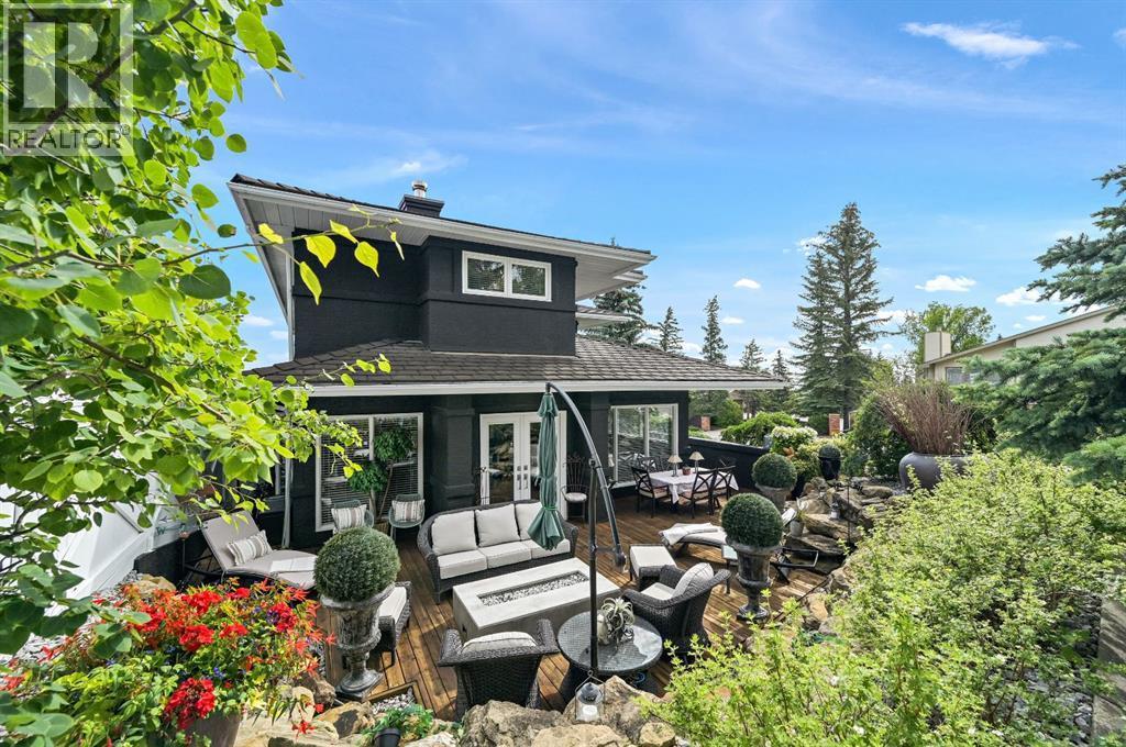 103 Stratton Park Sw, Calgary, AB - Outdoor With Deck Patio Veranda