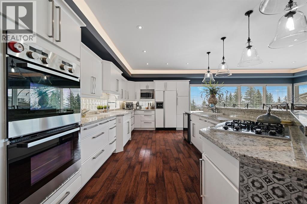 103 Stratton Park Sw, Calgary, AB - Indoor Photo Showing Kitchen With Upgraded Kitchen