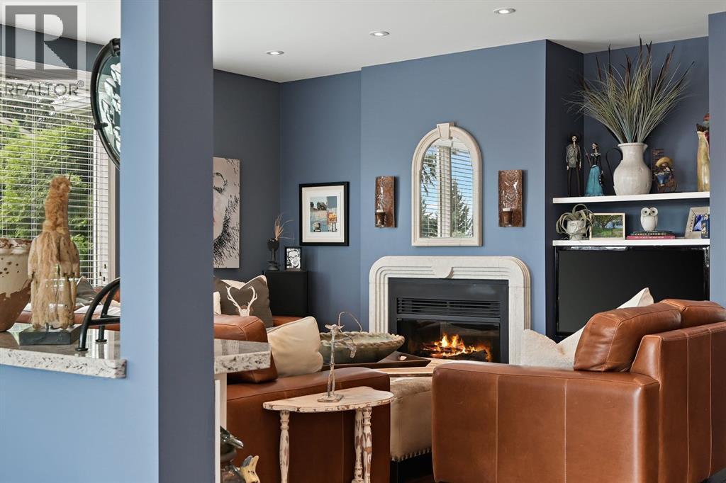 103 Stratton Park Sw, Calgary, AB - Indoor With Fireplace