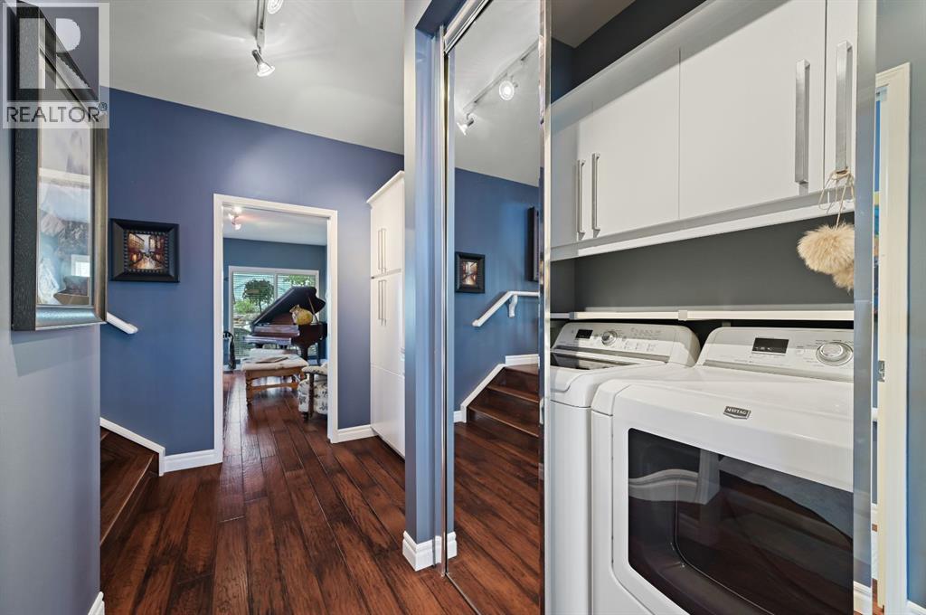 103 Stratton Park Sw, Calgary, AB - Indoor Photo Showing Laundry Room