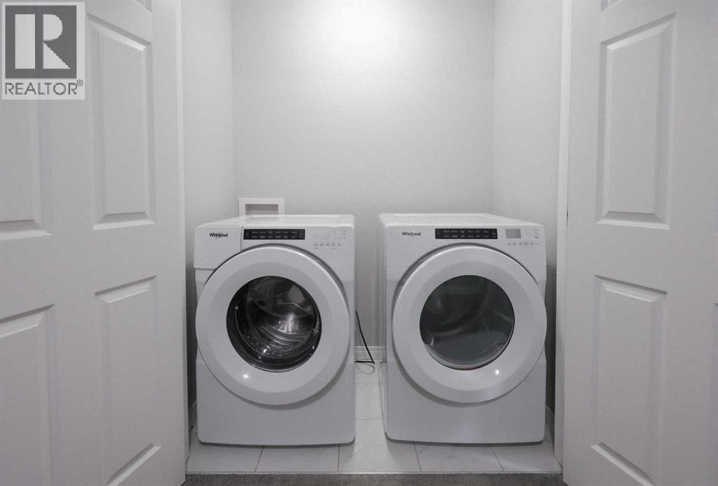 231 Windford Crescent Sw, Airdrie, AB - Indoor Photo Showing Laundry Room