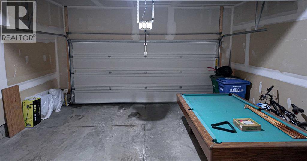 231 Windford Crescent Sw, Airdrie, AB - Indoor Photo Showing Garage