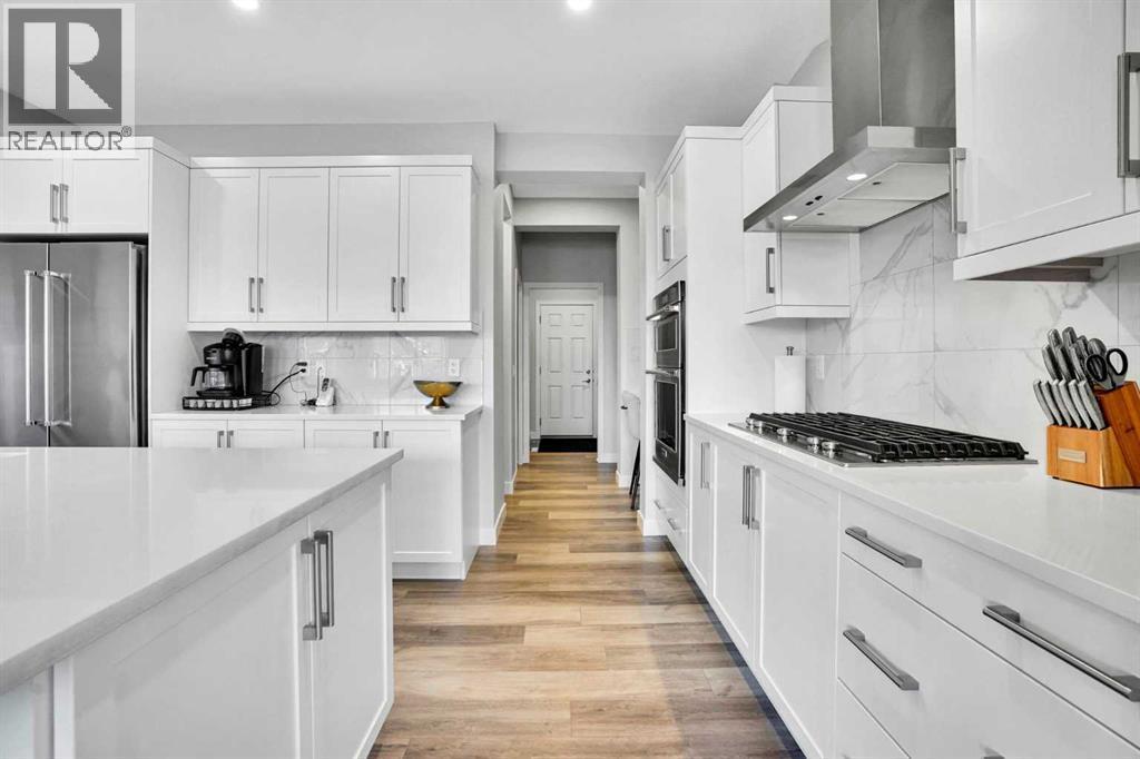 86 Edith Row Nw, Calgary, AB - Indoor Photo Showing Kitchen With Upgraded Kitchen