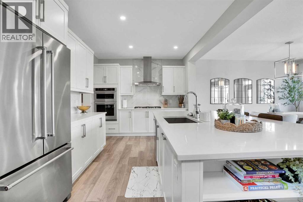 86 Edith Row Nw, Calgary, AB - Indoor Photo Showing Kitchen With Upgraded Kitchen