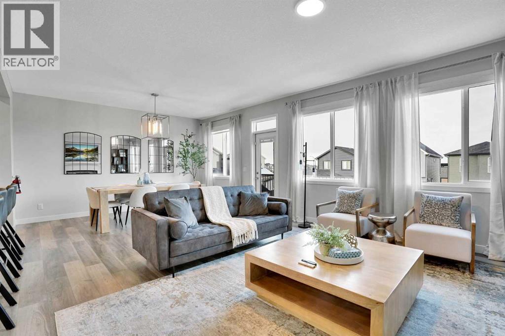 86 Edith Row Nw, Calgary, AB - Indoor Photo Showing Living Room