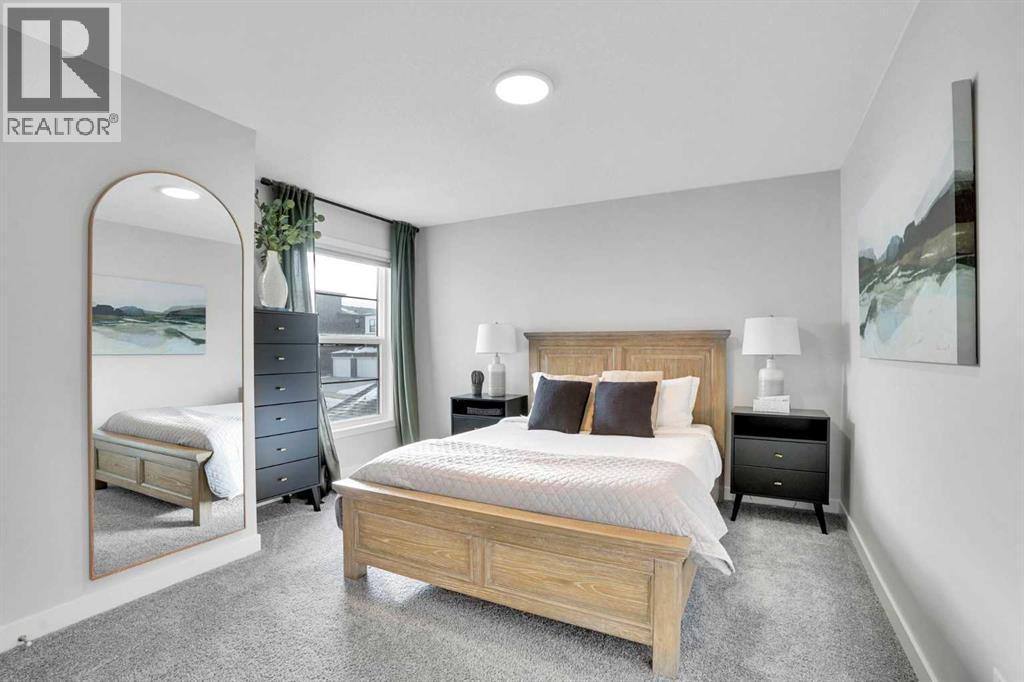 86 Edith Row Nw, Calgary, AB - Indoor Photo Showing Bedroom