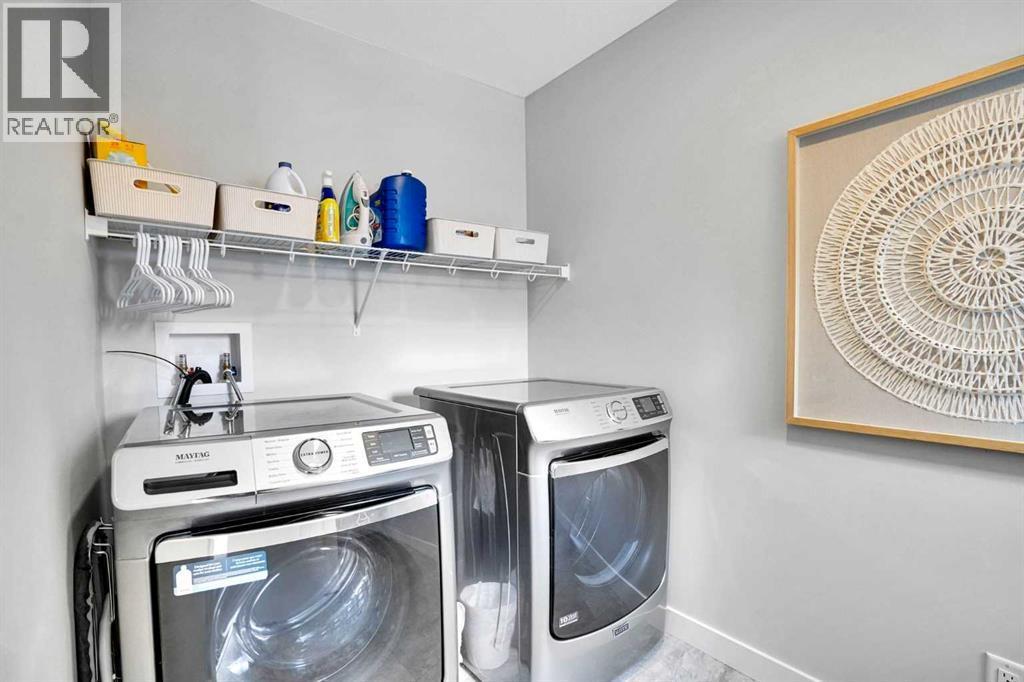 86 Edith Row Nw, Calgary, AB - Indoor Photo Showing Laundry Room
