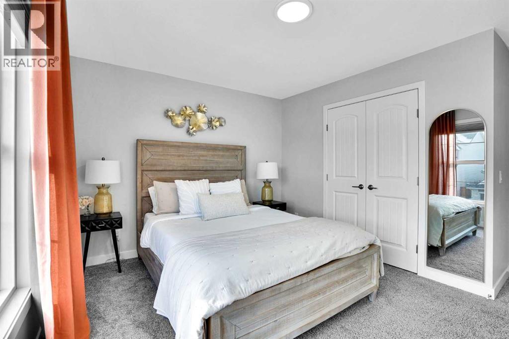 86 Edith Row Nw, Calgary, AB - Indoor Photo Showing Bedroom