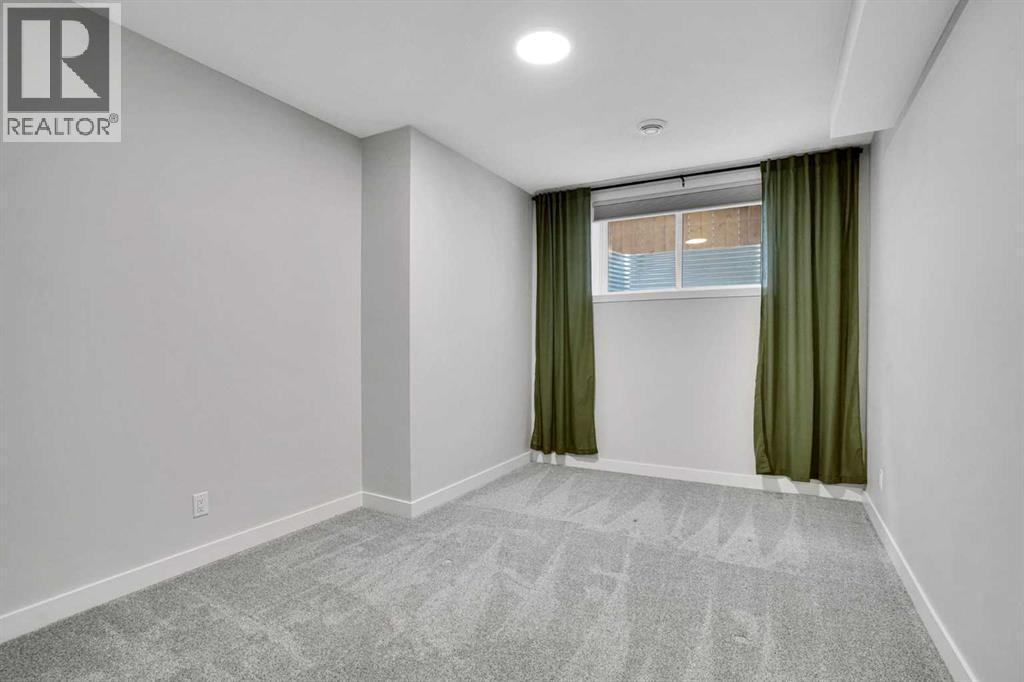 86 Edith Row Nw, Calgary, AB - Indoor Photo Showing Other Room