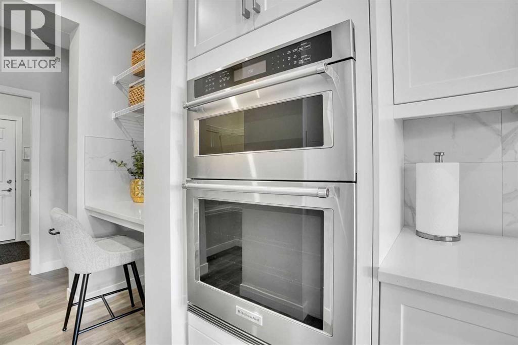 86 Edith Row Nw, Calgary, AB - Indoor Photo Showing Kitchen