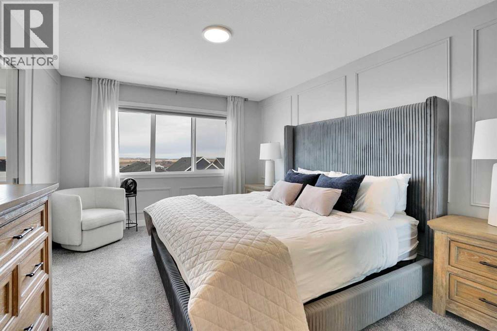 86 Edith Row Nw, Calgary, AB - Indoor Photo Showing Bedroom