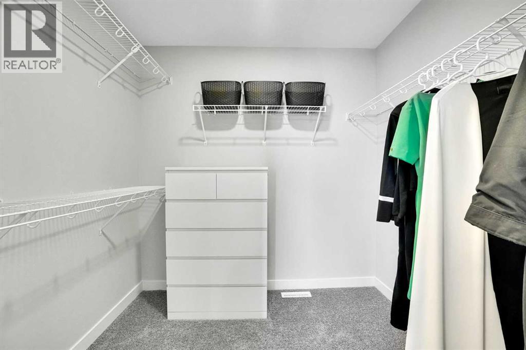 86 Edith Row Nw, Calgary, AB - Indoor With Storage