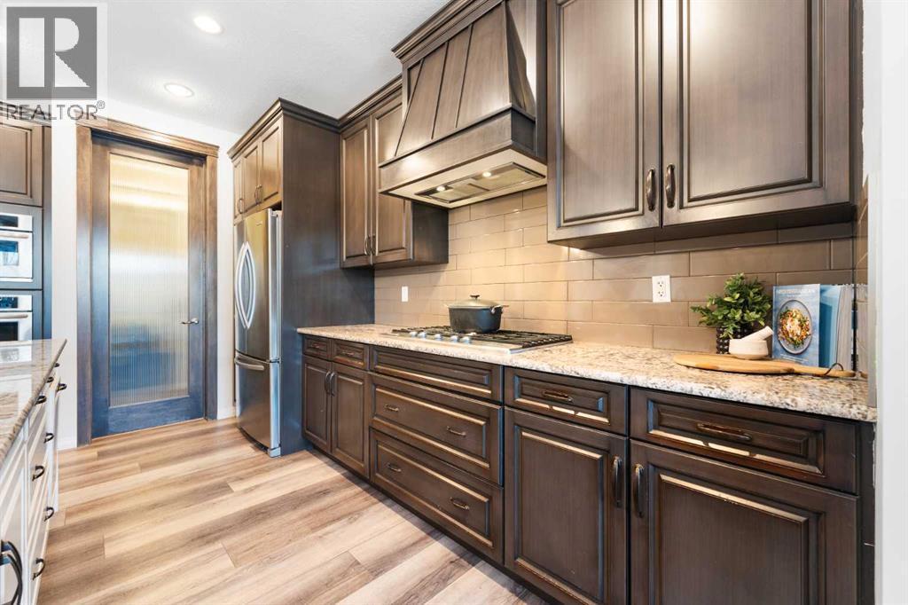 128 Auburn Bay Avenue Se, Calgary, AB - Indoor Photo Showing Kitchen With Upgraded Kitchen