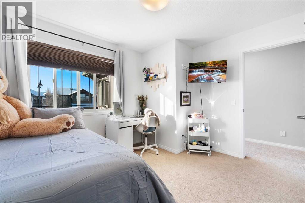 128 Auburn Bay Avenue Se, Calgary, AB - Indoor Photo Showing Bedroom