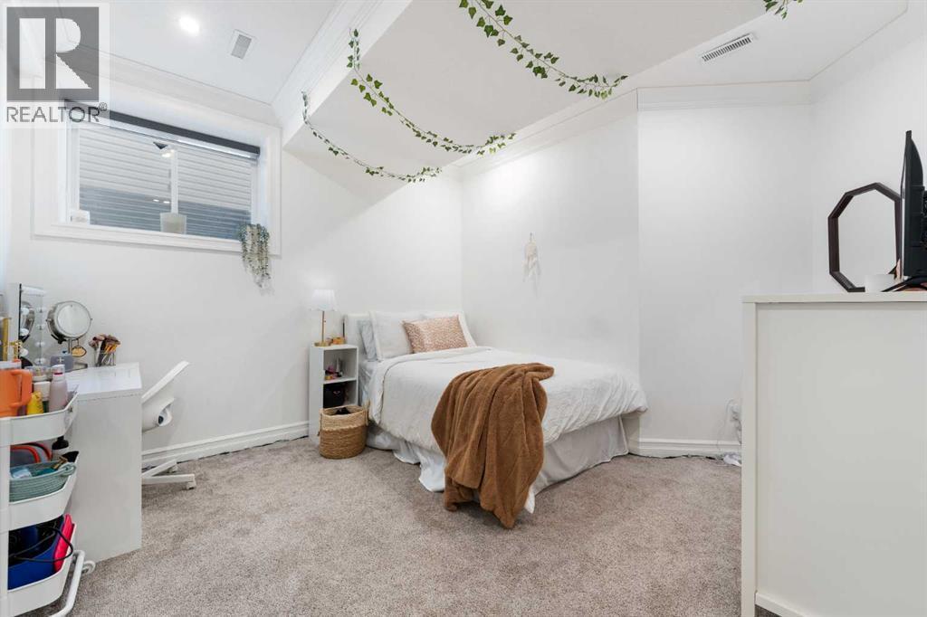 128 Auburn Bay Avenue Se, Calgary, AB - Indoor Photo Showing Bedroom