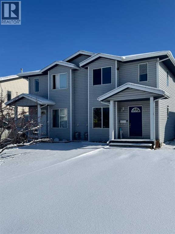 61 Lakeview Close, Blackfalds, AB - Outdoor With Facade