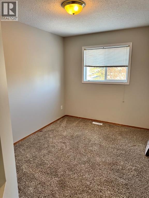 61 Lakeview Close, Blackfalds, AB - Indoor Photo Showing Other Room