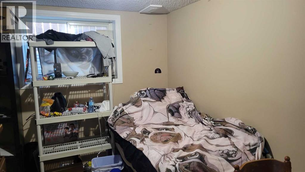 1908 Olympia Drive Se, Calgary, AB - Indoor Photo Showing Bedroom