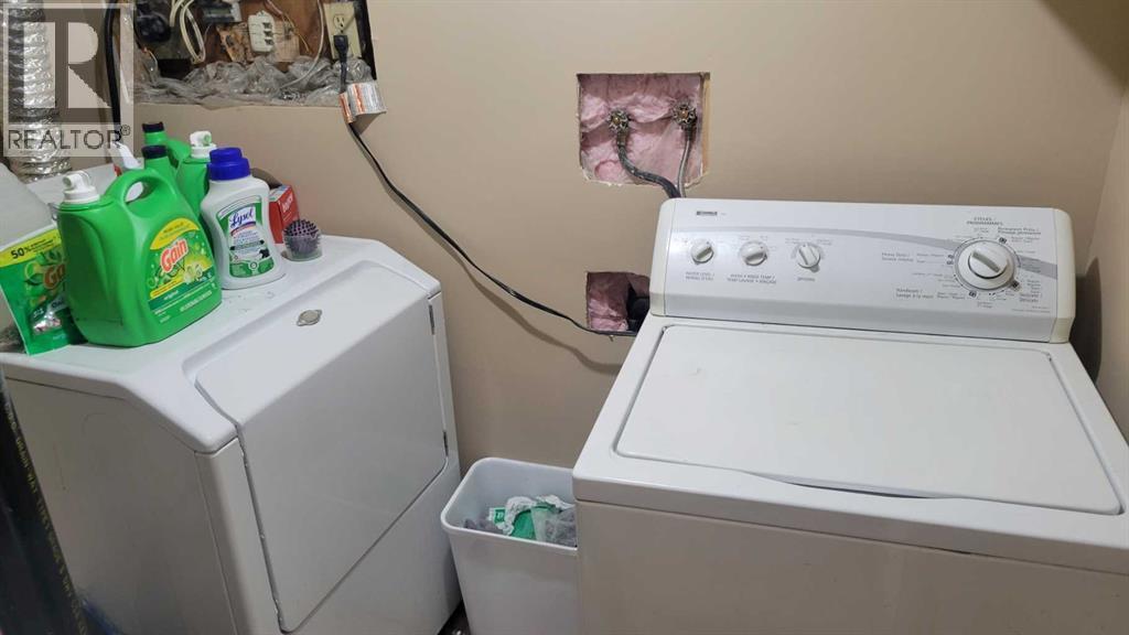 1908 Olympia Drive Se, Calgary, AB - Indoor Photo Showing Laundry Room