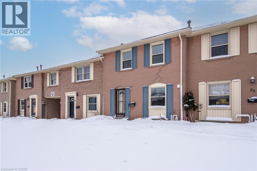 View of front of home featuring brick siding - 27 Queenston Drive, Kitchener, ON - Outdoor With Exterior