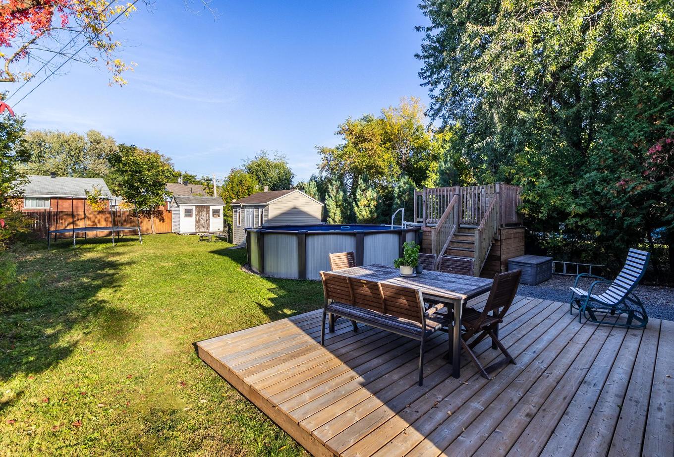 Cour - 214 Rue Fairfield, Longueuil (Greenfield Park), QC - Outdoor With Above Ground Pool With Deck Patio Veranda