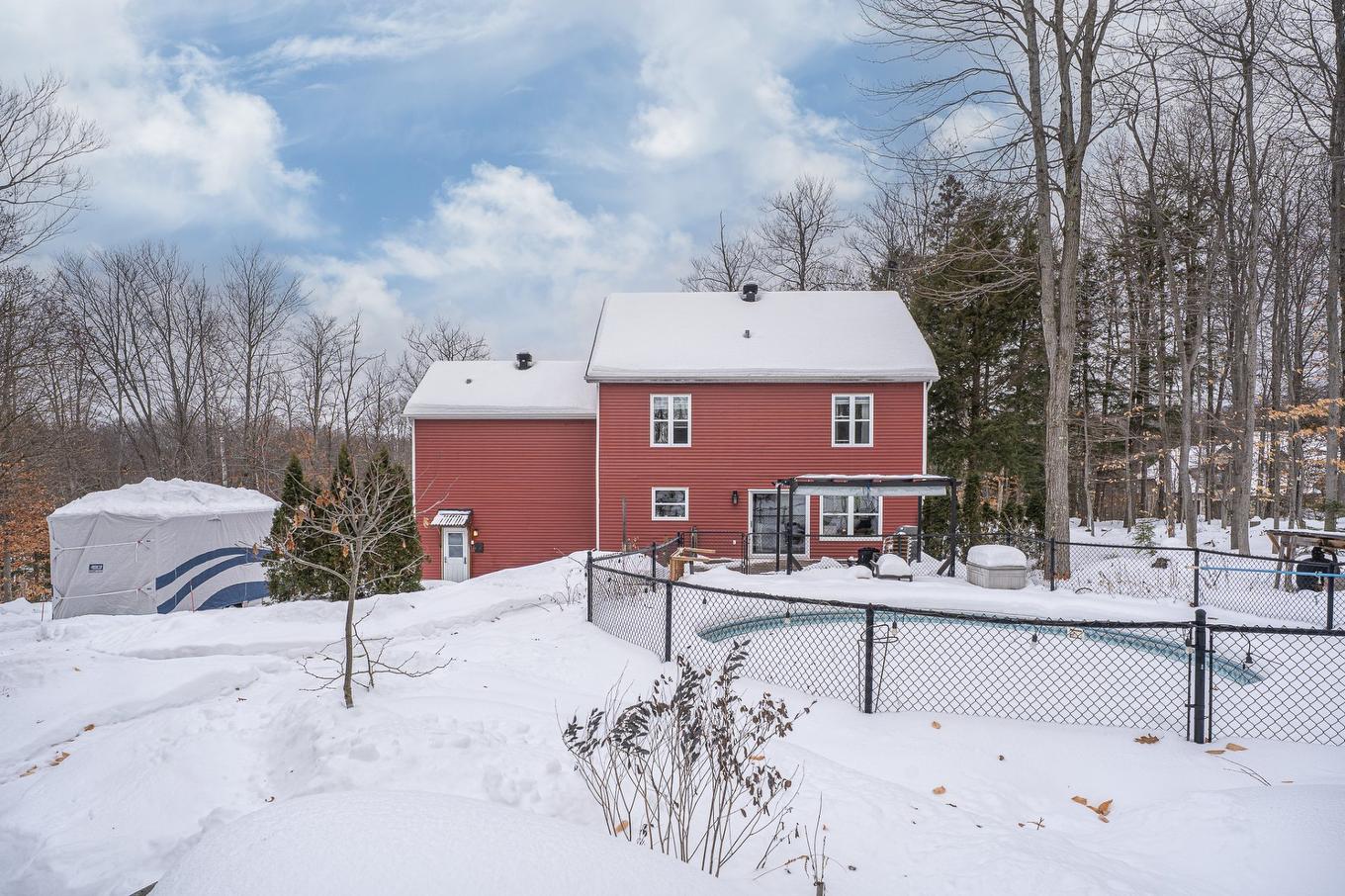 Back facade - 390 Rue Du Clos-Du-Meunier, Prévost, QC - Outdoor With Deck Patio Veranda