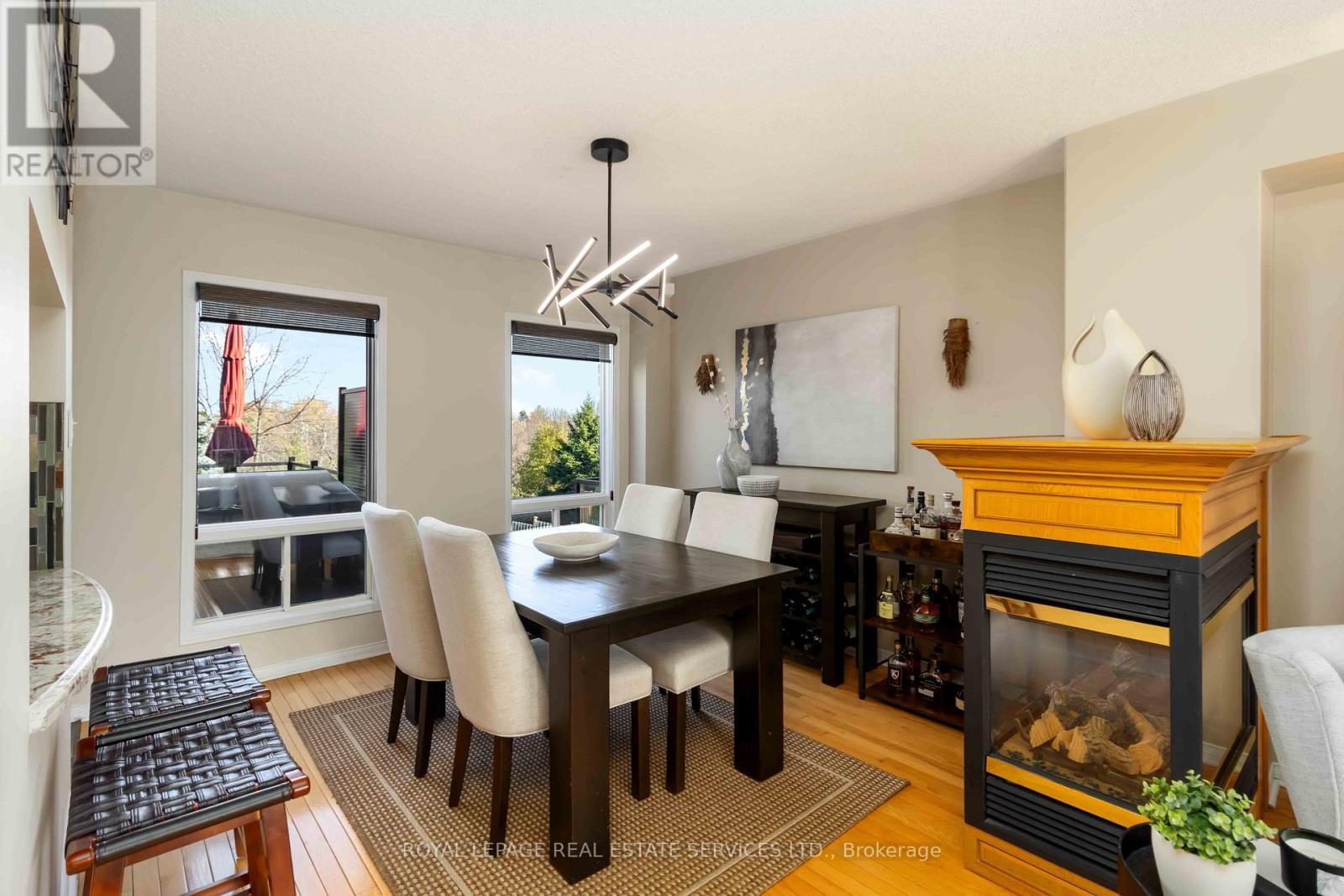 1584 Woodhenge Way, Mississauga, ON - Indoor Photo Showing Dining Room With Fireplace