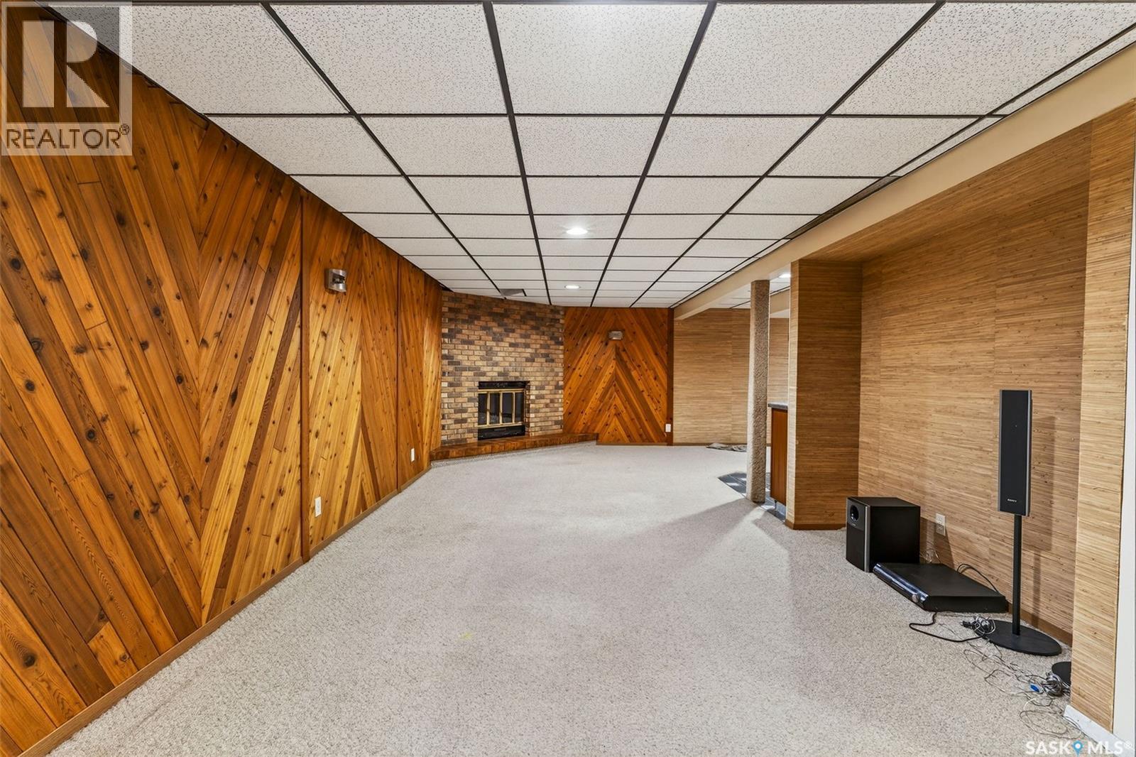 418 Tennant Way, Saskatoon, SK - Indoor Photo Showing Other Room With Fireplace