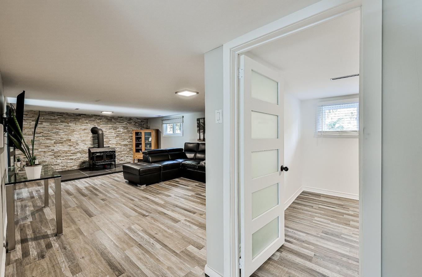 Salle familiale - 466 Rue Lamontagne, Mascouche, QC - Indoor Photo Showing Other Room