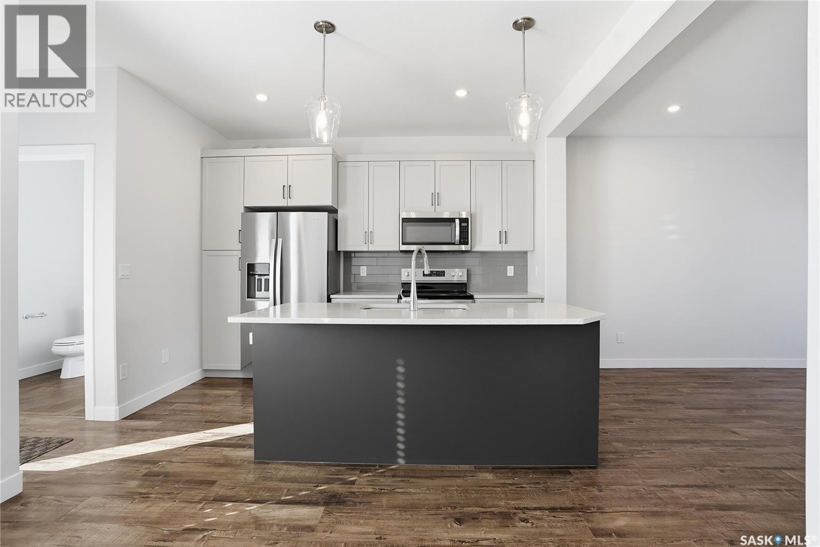 966 Mcfaull Manor, Saskatoon, SK - Indoor Photo Showing Kitchen With Upgraded Kitchen