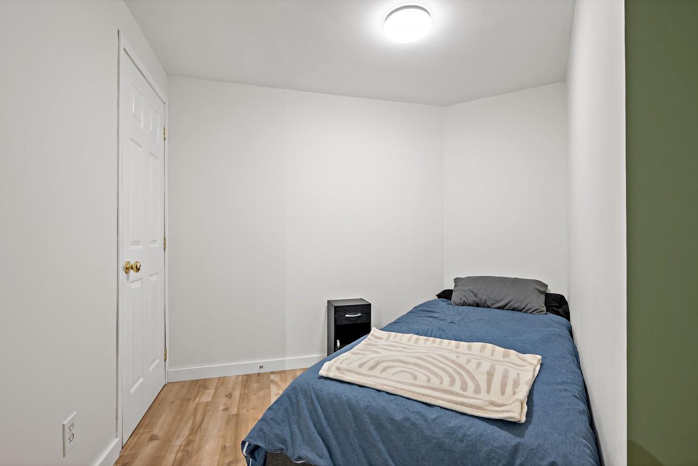 Logement - 945 Place Du Repos, Mont-Tremblant, QC - Indoor Photo Showing Bedroom