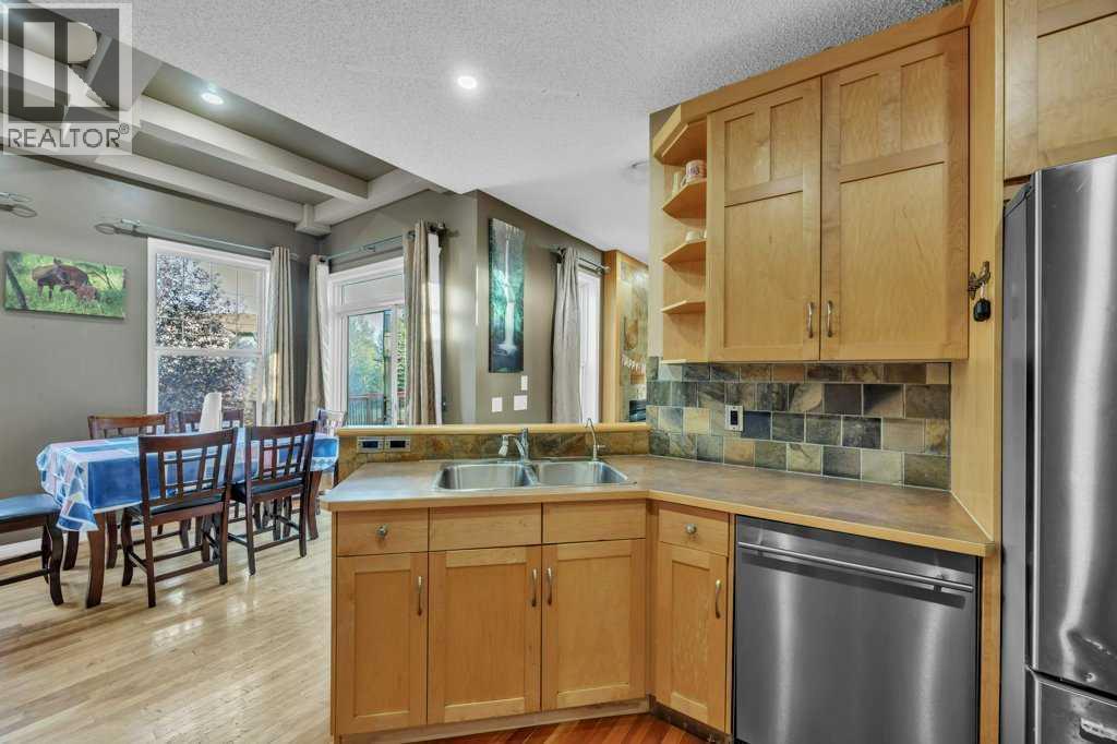 550 Copperfield Boulevard Se, Calgary, AB - Indoor Photo Showing Kitchen With Stainless Steel Kitchen With Double Sink