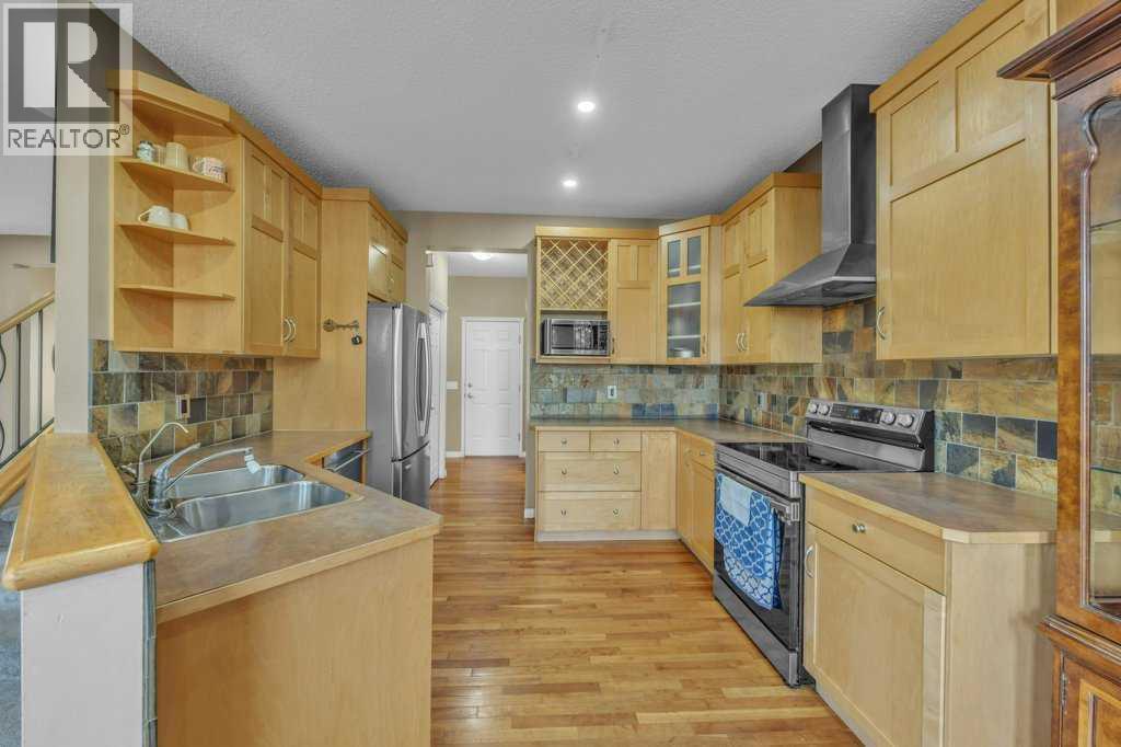 550 Copperfield Boulevard Se, Calgary, AB - Indoor Photo Showing Kitchen With Stainless Steel Kitchen With Double Sink