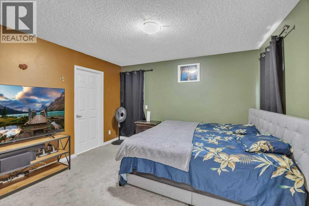 550 Copperfield Boulevard Se, Calgary, AB - Indoor Photo Showing Bedroom