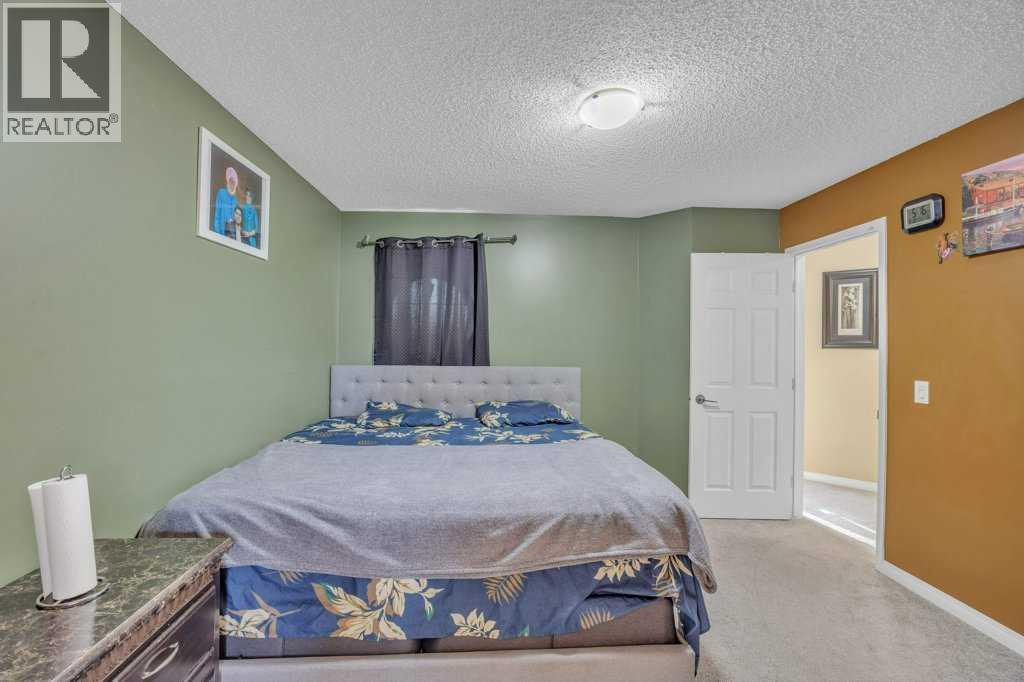 550 Copperfield Boulevard Se, Calgary, AB - Indoor Photo Showing Bedroom