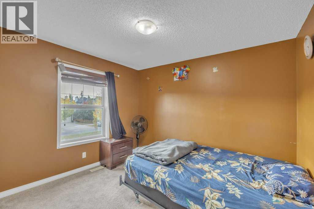 550 Copperfield Boulevard Se, Calgary, AB - Indoor Photo Showing Bedroom