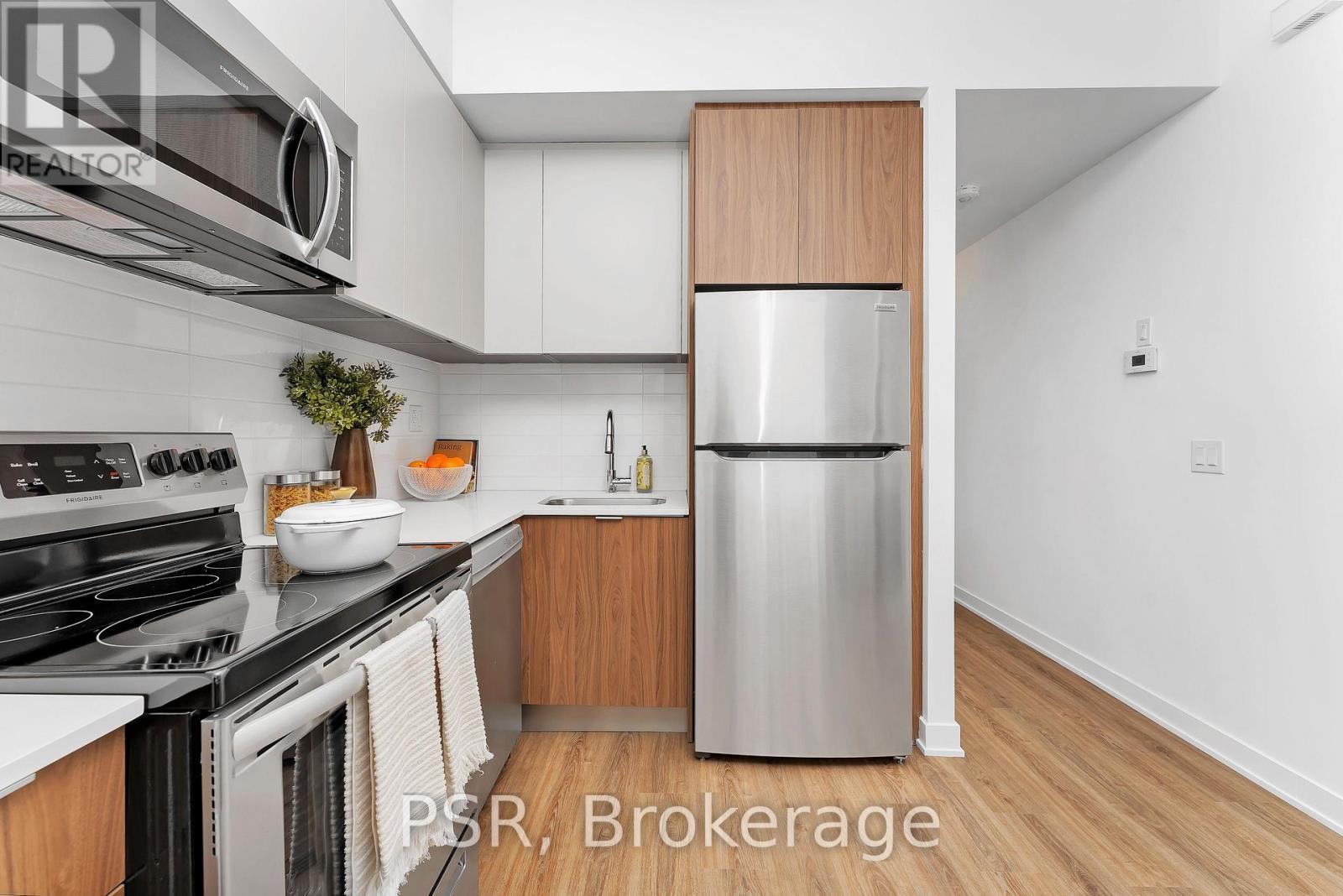 110 - 41 Danforth Road, Toronto, ON - Indoor Photo Showing Kitchen With Stainless Steel Kitchen